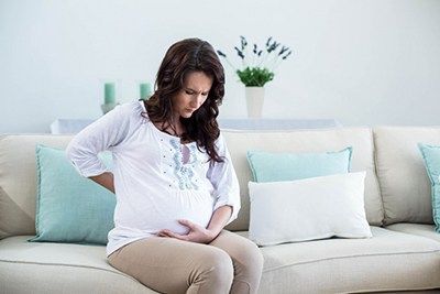 Почему возникают боли в паху при беременности
